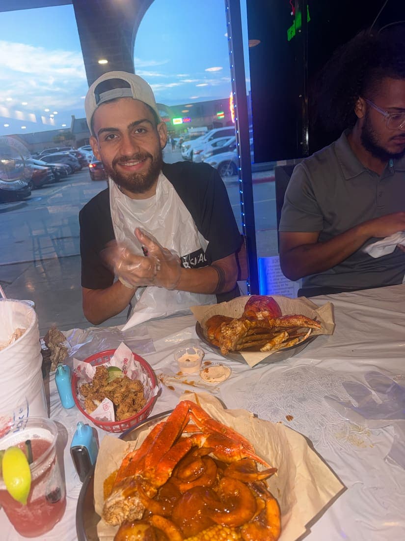 Team members around a table at a seafood dinner