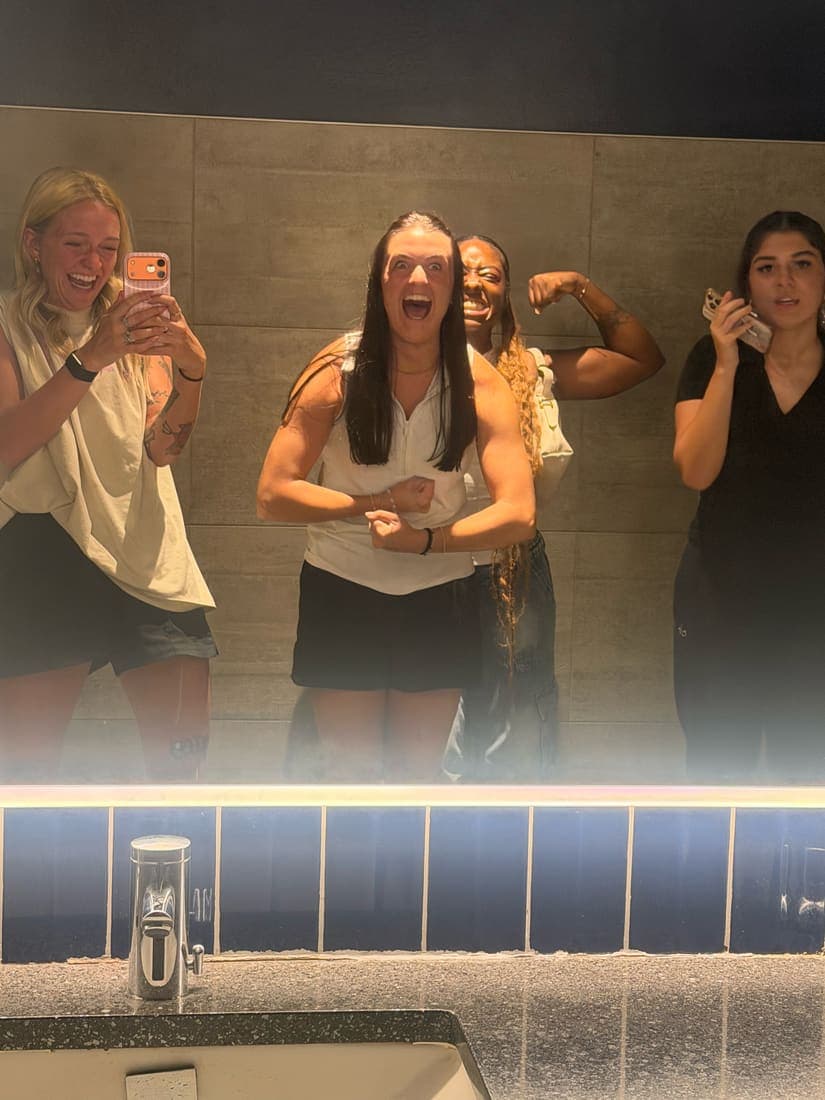Four team members in a mirror photo before heading out